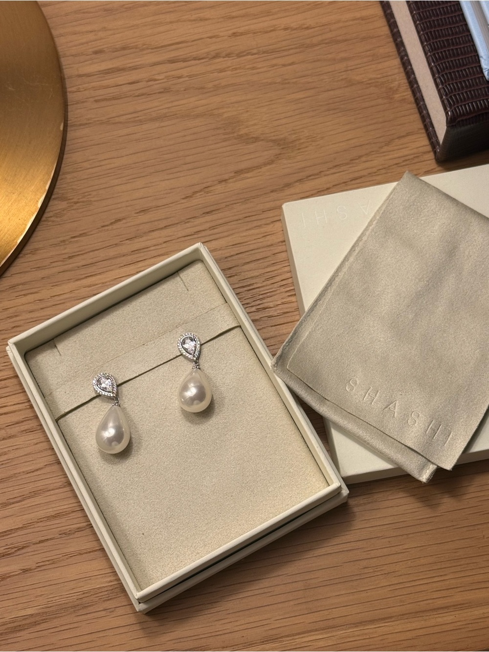 SHASHI White Pearl Drop Earrings with Crystal Teardrop / Bridal Earrings